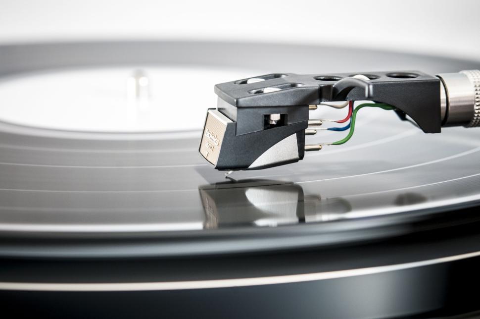 A close up of a record and needle