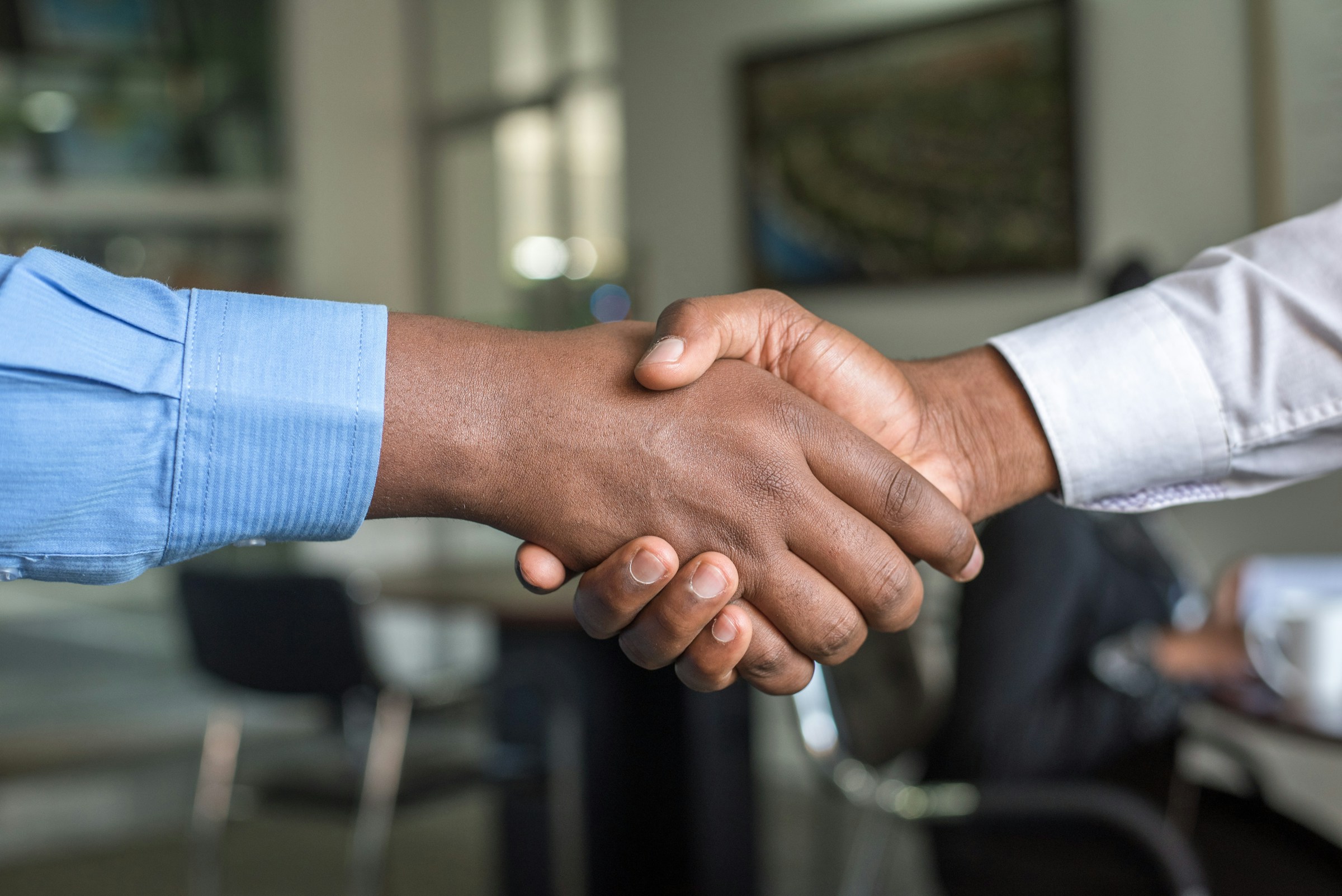 Close up of two people shaking hands